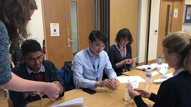 Participants gaining practical tips on teaching whilst at work from an experienced faculty of surgical educator  during the Basics for Medical Education Course.